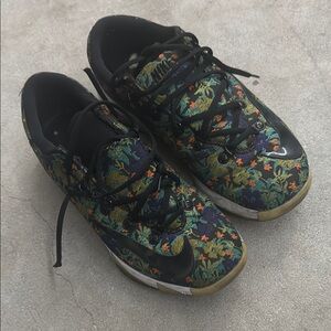 Nike Black and Green Sneakers with Flexible Upper and Rounded Toe